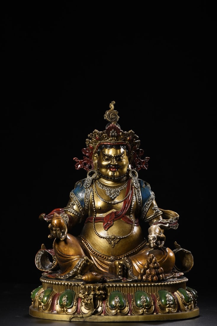 Copper Painted Yellow Jambhala Statue: A painted bronze statue of the Yellow God of Wealth, 32cm high, 26cm wide, 21cm thick, and weighing 3560g. Provenance:from the collection of George Stopher, Kent, purchased from P&M Waldo Antiques, Lo