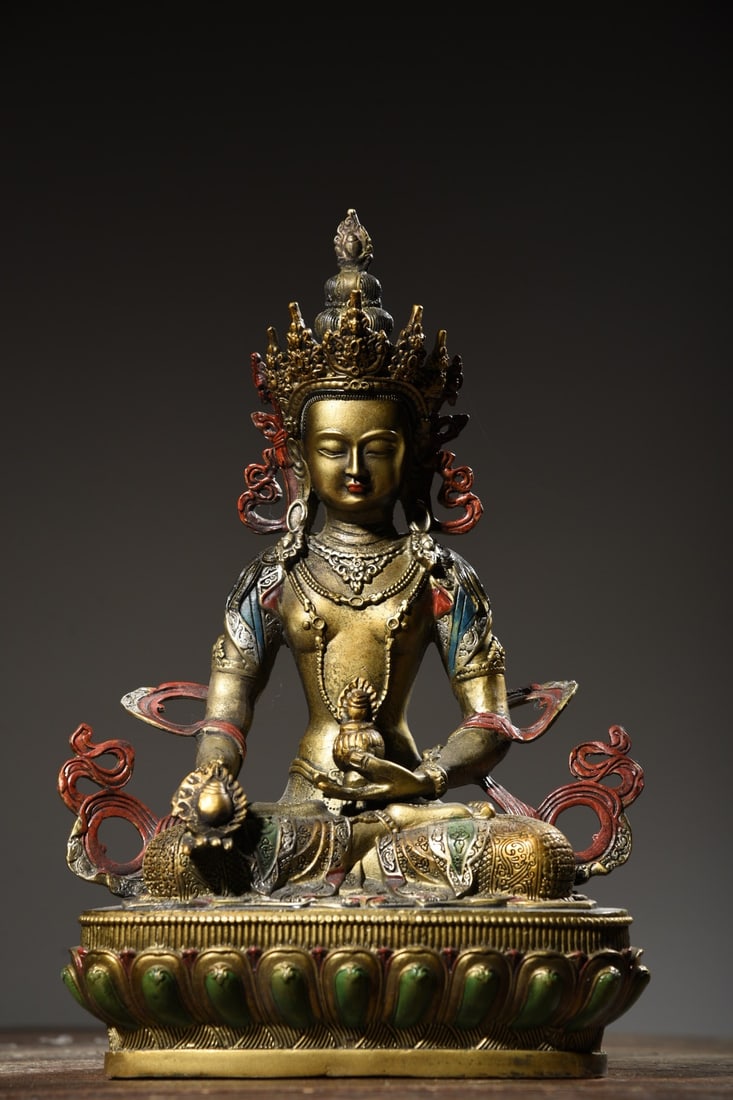 Copper Painted Vajradhara Statue: painted bronze Vajradhara statue, 29cm high, 20cm wide, 11cm thick, and weighing 1650g. Provenance:from the collection of George Stopher, Kent, purchased from P&M Waldo Antiques, London. Our cooperati