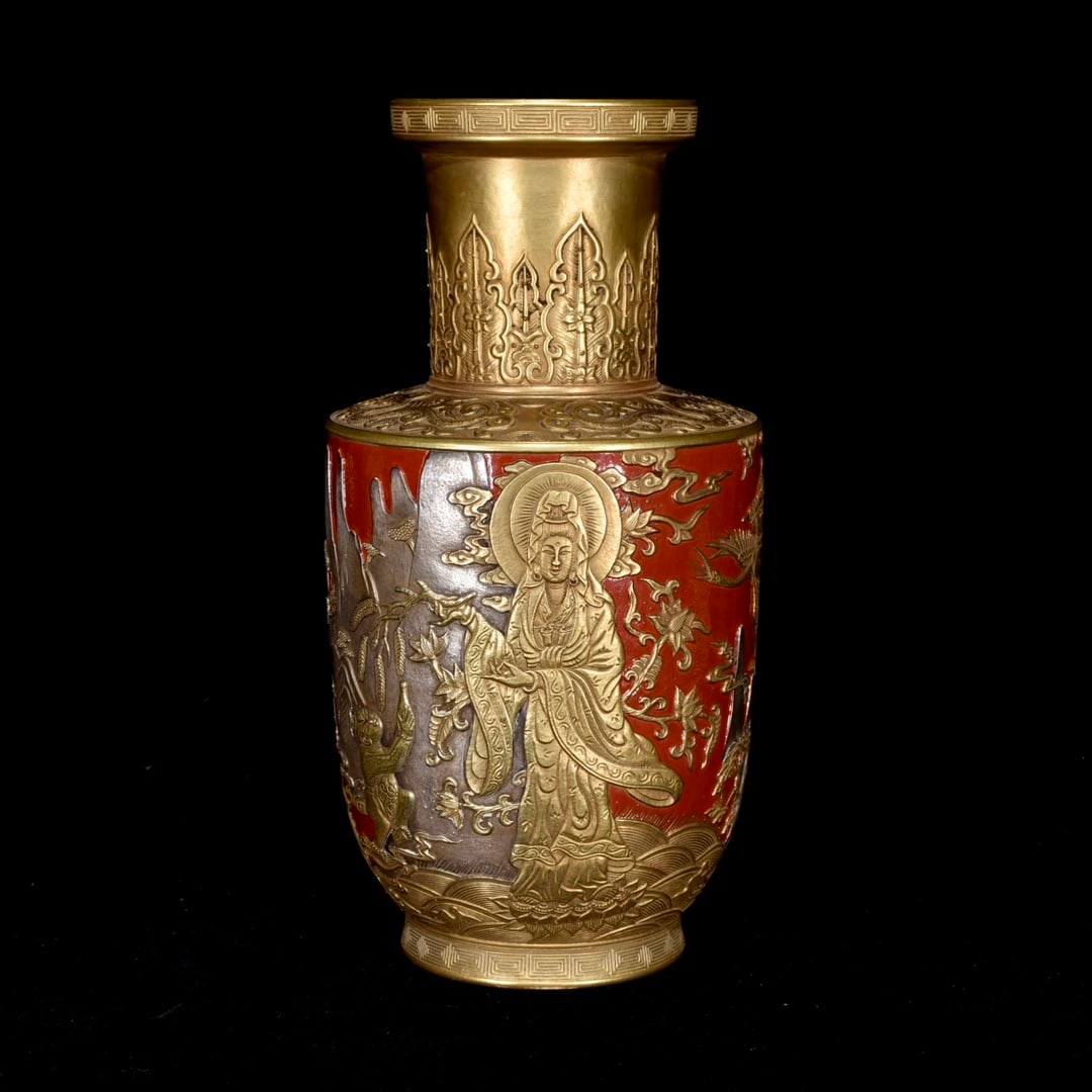 A Qing Dynasty Qianlong Period Relief Gold and Silver Bottle with Child Worshipping Guanyin Design: A Qing Dynasty Qianlong period gold and silver relief vase depicting children worshipping Guanyin, 25.5 x 13 cm. Provenance:Private collection from a professor in University of Nottingham. Our coopera
