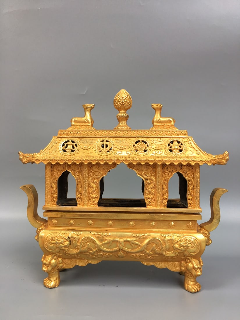 Golden Square Lion Leg Incense Burner: This gold-plated square incense burner with lion legs is exquisitely crafted with a thick patina. It measures 30cm wide, 28cm high, and 8cm thick, and weighs approximately 2600g. Provenance:Private co
