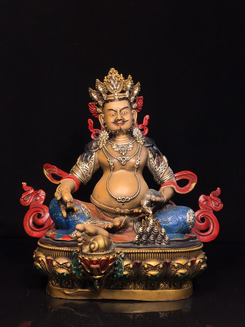 Exquisitely crafted pure copper painted Yellow Jambhala Buddha statue: This is a finely crafted pure copper painted Yellow Jambhala Buddha statue. It is exquisitely made with a thick patina and a unique shape. It measures 27cm wide, 29cm high, and 15.5cm thick, and weigh