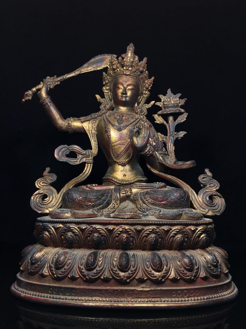 Exquisitely crafted pure copper Manjushri Bodhisattva statue: This is a finely crafted pure copper Manjushri Bodhisattva statue. It is exquisitely made with a thick patina. Dimensions: 30cm wide, 43cm high, 20cm thick, and weighs approximately 5100g. Provenance: