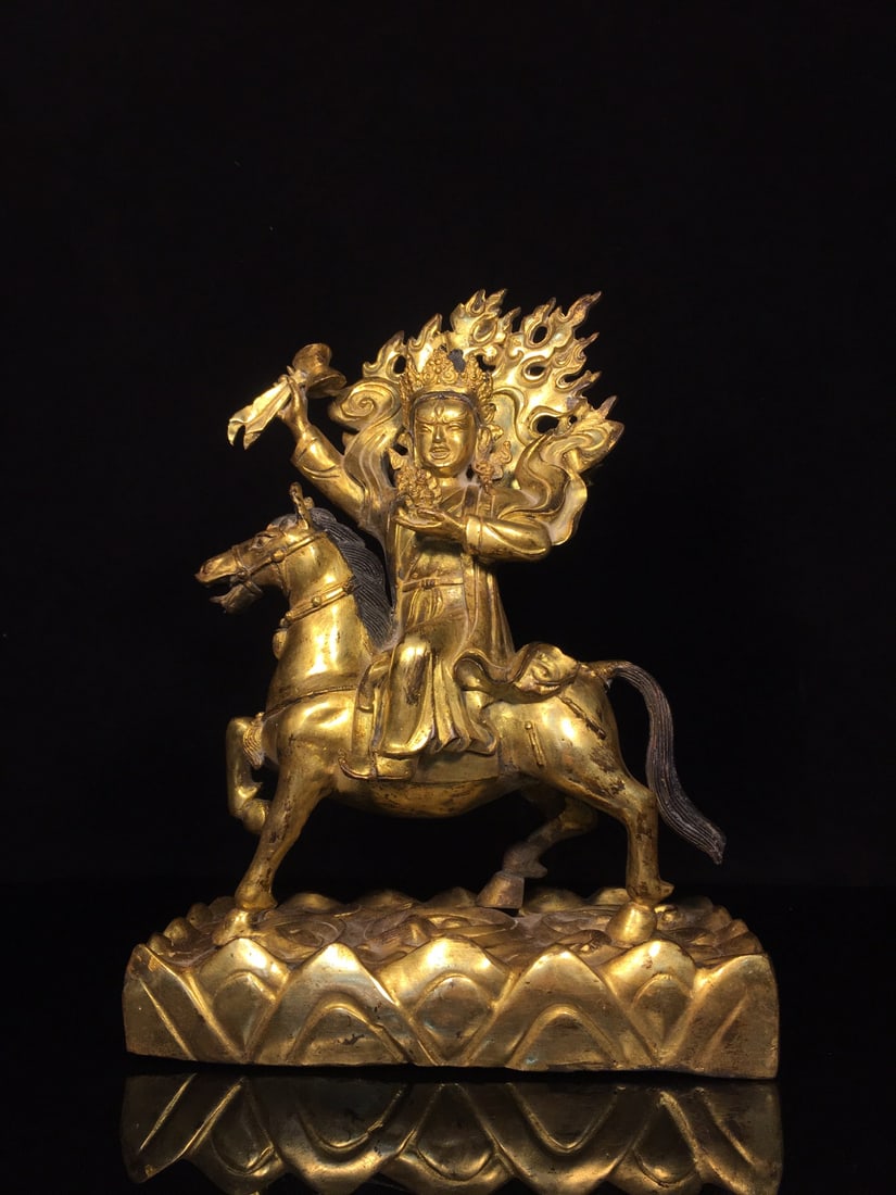 Golden Auspicious Goddess Buddha Statue: This golden auspicious goddess Buddha statue is exquisitely crafted with a thick patina. It measures 24cm in width, 33cm in height, and 11cm in thickness, and weighs approximately 5200g. Provenance:Pr