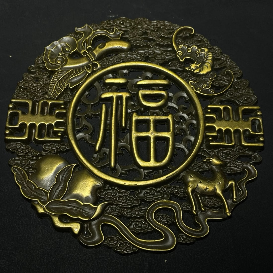 Bronze "Fu" character carving ornament: A bronze (Fu, meaning good fortune) character carving, measuring 18 cm in diameter and 0.5 cm in thickness. Provenance:Private collection from a professor in The University of Edinburgh. Our cooperati