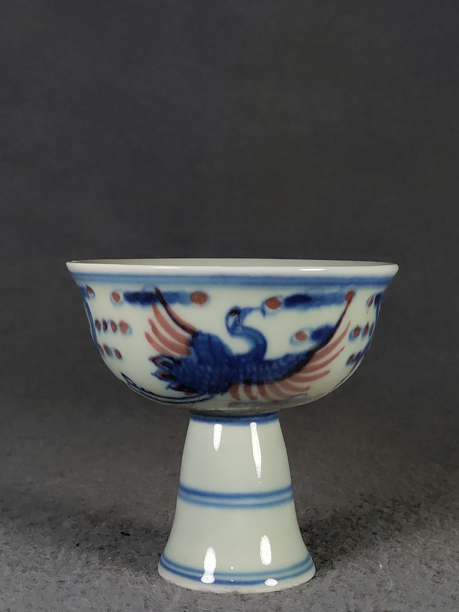 Qing Dynasty Blue and White Underglaze Red Stem Cup with Auspicious Clouds and Cranes (1 of 7)