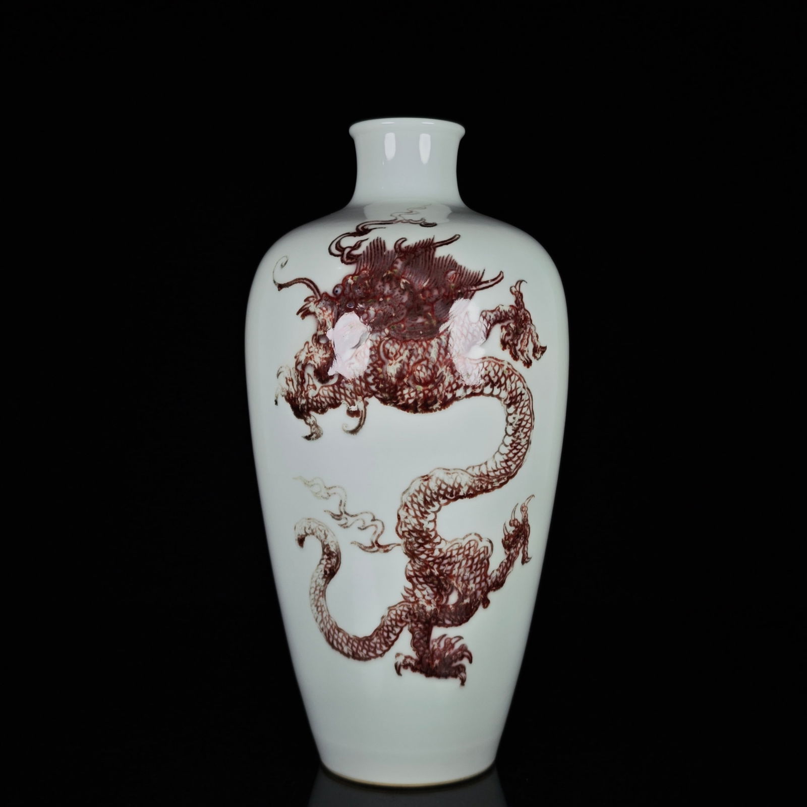 A pair of underglaze red dragon-patterned plum vases from the Kangxi period of the Qing Dynasty. (1 of 9)