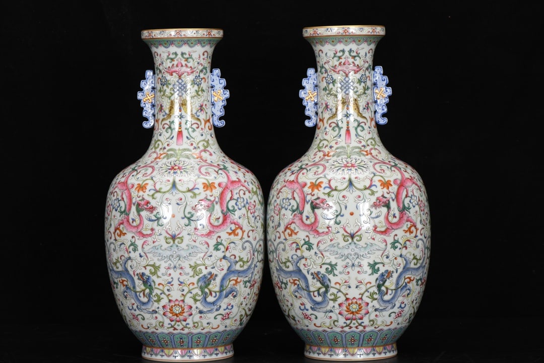 A Qing Dynasty Qianlong period enamel-painted white-ground patterned double-eared vase (1 of 9)