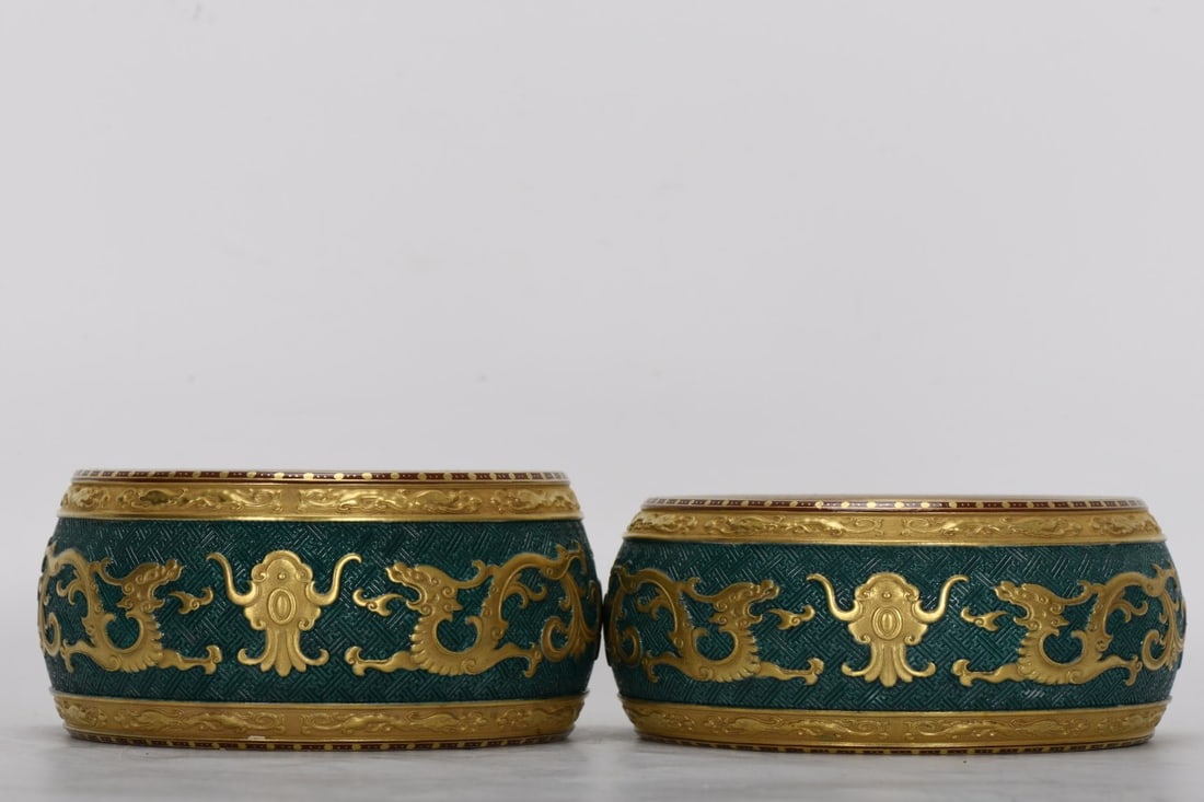 Qing Dynasty, Qianlong Period, Enamelled Carved Dragon Pattern Gilded Inkstone: A Qing Dynasty, Qianlong period, enamel-painted dragon-patterned inkstone with gilt inscription, 5.8 cm high, 11.5 cm in diameter at the mouth, 13.2 cm in diameter at the belly, and 12 cm in diameter