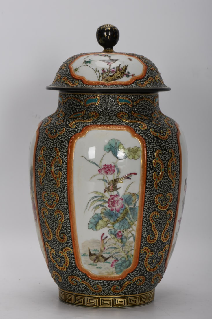 A Qing Dynasty Qianlong period enamel-painted and gilded covered jar with openwork floral and bird (1 of 8)