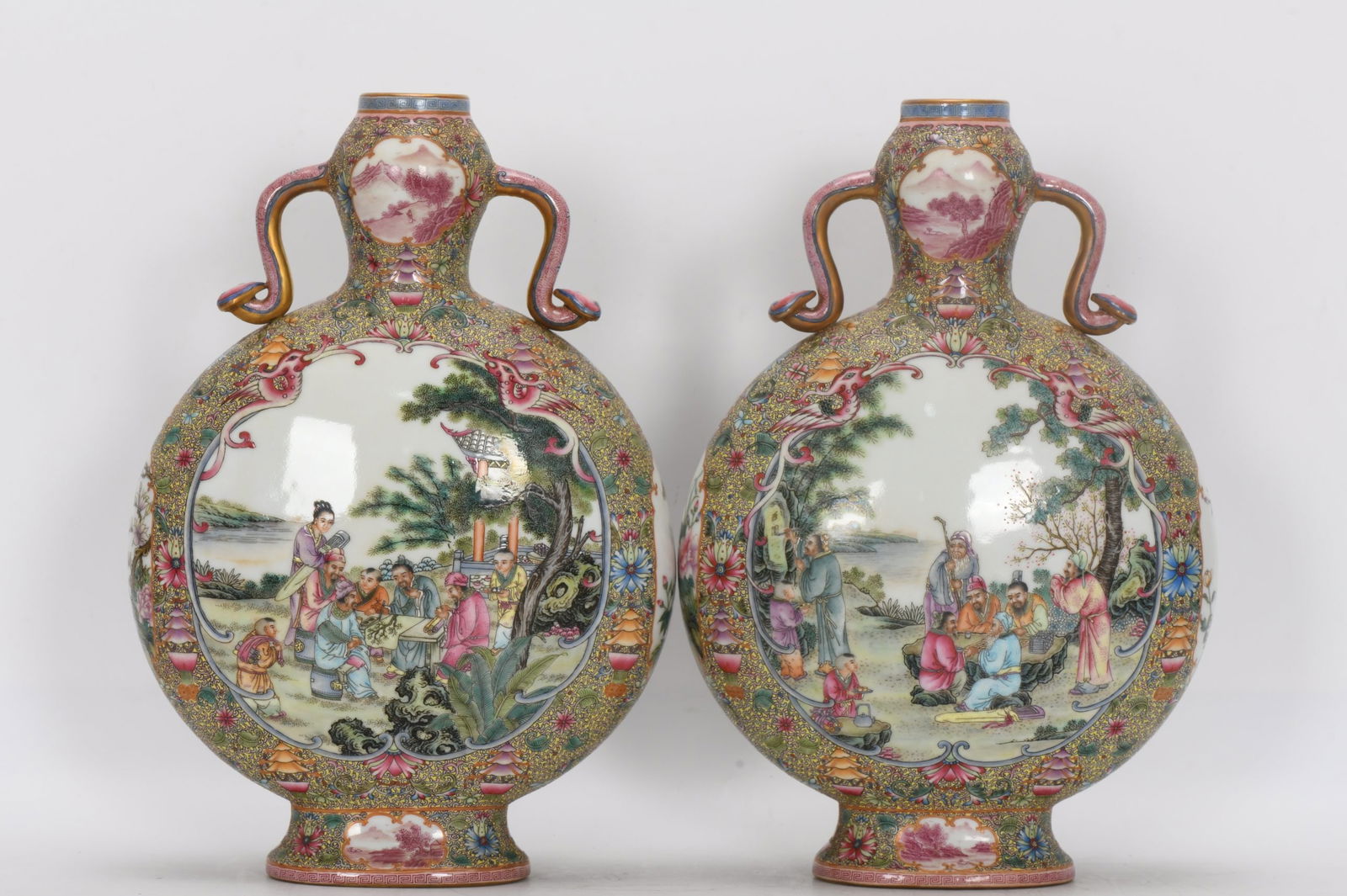 A Qing Dynasty Qianlong period famille rose enamel moon flask with openwork figures and double (1 of 9)