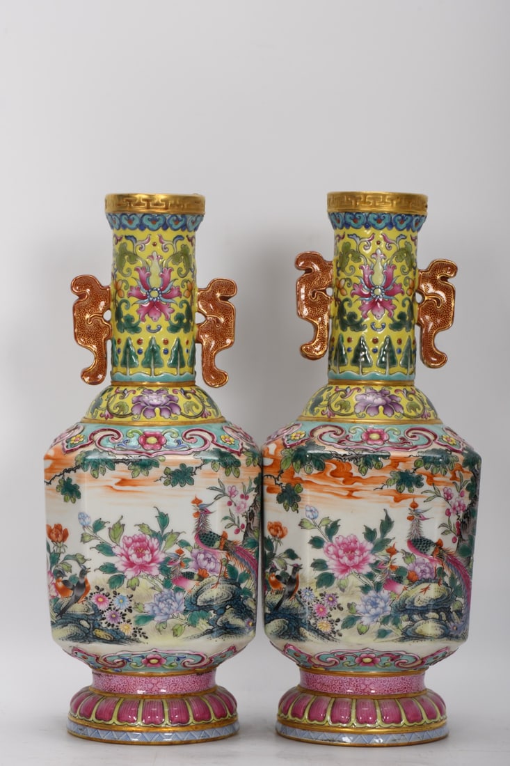 A square vase with famille rose enamel decoration on a yellow ground, depicting flowers and birds,: square vase with famille rose enamel decoration on a yellow ground, depicting flowers and birds, with two handles. It measures 25.5 cm in height, 4.7 cm in mouth diameter, 10 cm in belly diameter, and