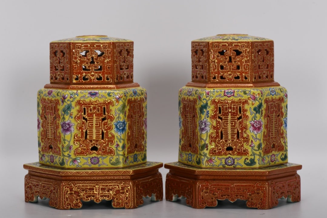A six-sided enamel-painted, openwork, gilded incense burner from the Qianlong period of the Qing: A six-sided enamel-painted, openwork, gilt-decorated incense burner from the Qianlong period of the Qing dynasty. It is 18 cm high, with a mouth diameter of 10.3 cm, a belly diameter of 15 cm, and a b