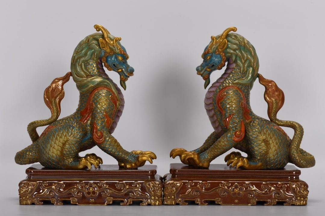 Qing Dynasty, Qianlong Period, Enamelled Gilt Qilin: A Qing Dynasty, Qianlong period, enamel-painted gilt-decorated kylin, 21 cm high, 17 cm long, base length 16.3 cm. Provenance:A notable private collector in Kensington, London, United Kingdom. Our coo