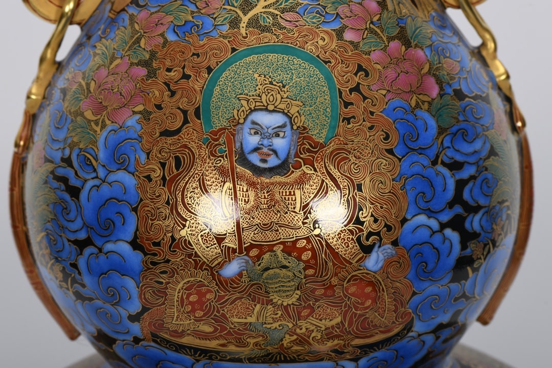 A Qing Dynasty Qianlong Period Enamel-Painted Gilded Thangka Figure Gourd-Shaped Vase: A gourd-shaped vase with enamel and gold-painted Thangka figures from the Qianlong period of the Qing dynasty, 51 cm high, 12 cm in mouth diameter, 30 cm in belly diameter, and 16 cm in base diameter.