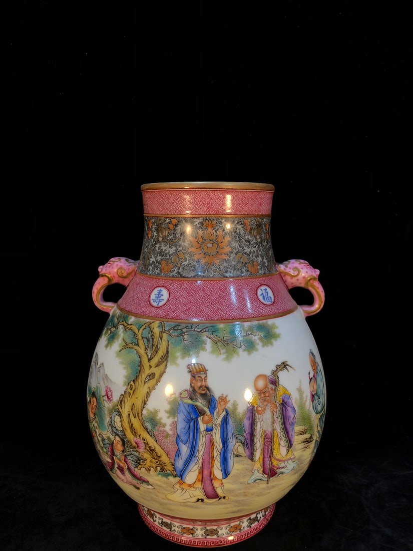 A Qing Dynasty Qianlong period famille rose vase with two handles depicting figures and stories.: A Qing Dynasty, Qianlong period, famille rose enamel vase with two handles depicting figures and scenes, 36 cm high, 14 cm in mouth diameter, and 15.8 cm in base diameter. Provenance:A notable private
