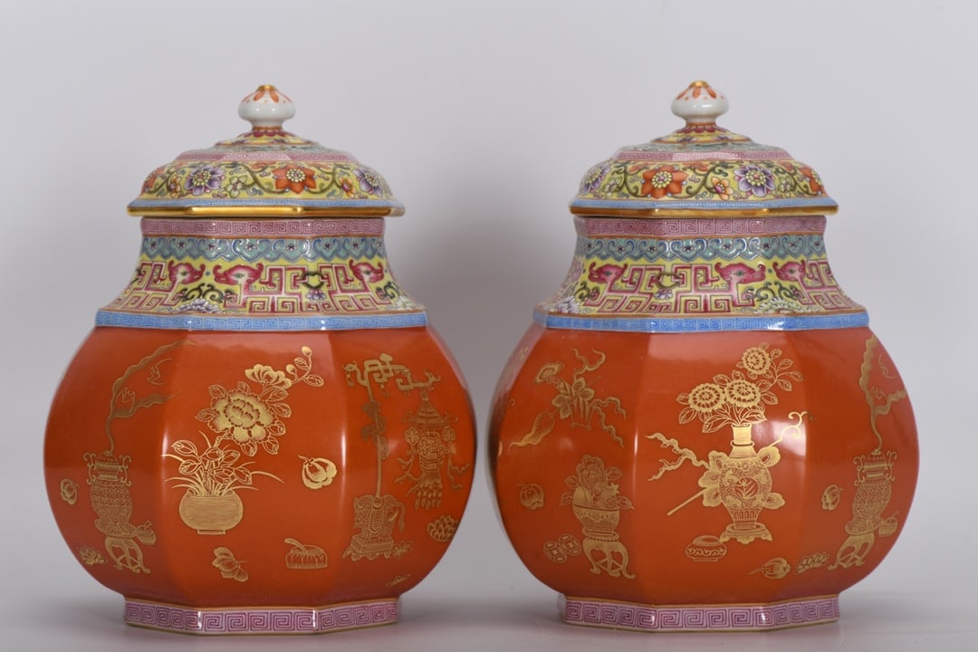 A Qing Dynasty Qianlong period enamel-painted coral red gilt-decorated octagonal covered jar with (1 of 8)