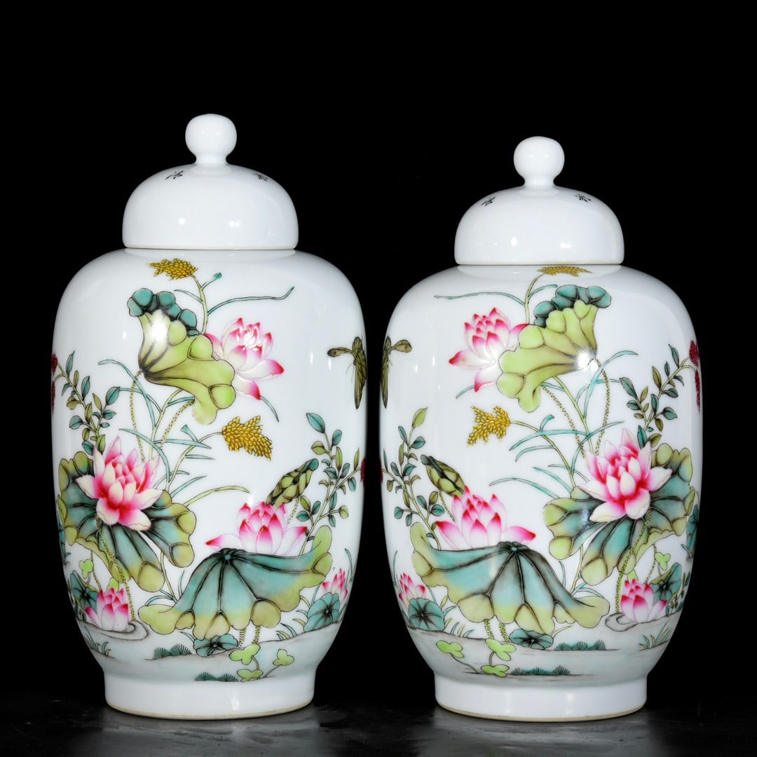 A pair of Qing Dynasty Qianlong period enamel-painted covered jars with floral, bird, butterfly, and (1 of 9)