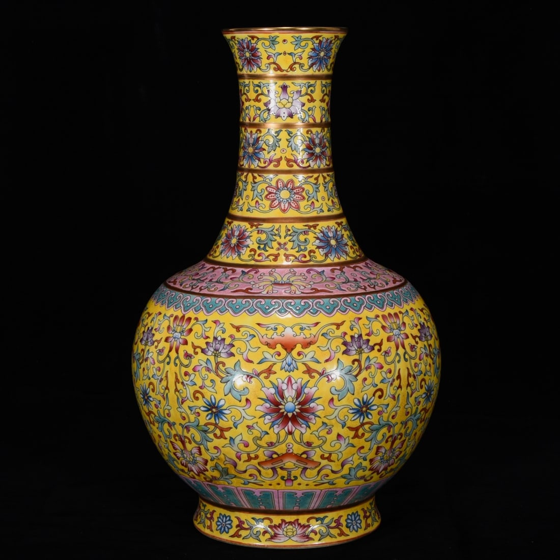 A Qing Dynasty Qianlong Period Yellow-Ground Famille Rose Gilt Pattern Vase: A Qing Dynasty Qianlong period yellow-ground famille rose vase with gilt decoration, 32.5 cm high and 20 cm in diameter. Provenance:Private collection from a professor in University of York. Our coope
