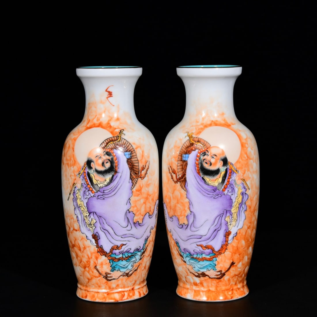 A pair of Qing Dynasty Qianlong period Lang Shining enamel-painted plum vases with Bodhidharma: A pair of Qing Dynasty Qianlong period Lang Shining enamel-painted plum vases with Bodhidharma figure design; 24.5 cm x 10.5 cm Provenance:Private collection from a professor in University of York. Ou