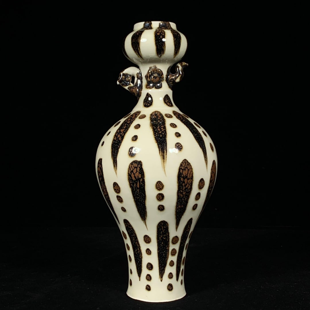 Song Dynasty Ding Ware Phoenix-Head Vase with Iron Rust Spots: A Song Dynasty Ding ware phoenix-head vase with iron rust spots, 29 cm high and 12.5 cm in diameter. Provenance:Private collection from a professor in University of York. Our cooperative logistics ser