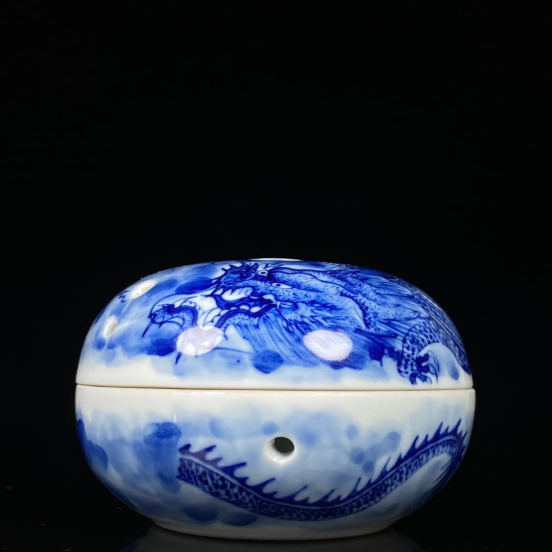 Qing Dynasty, Qianlong Period, Blue and White Dragon Pattern Incense Burner: A blue and white porcelain incense burner with dragon design from the Qianlong period of the Qing dynasty, 6 cm high and 9 cm wide. Provenance:Private collection from a professor in University of York
