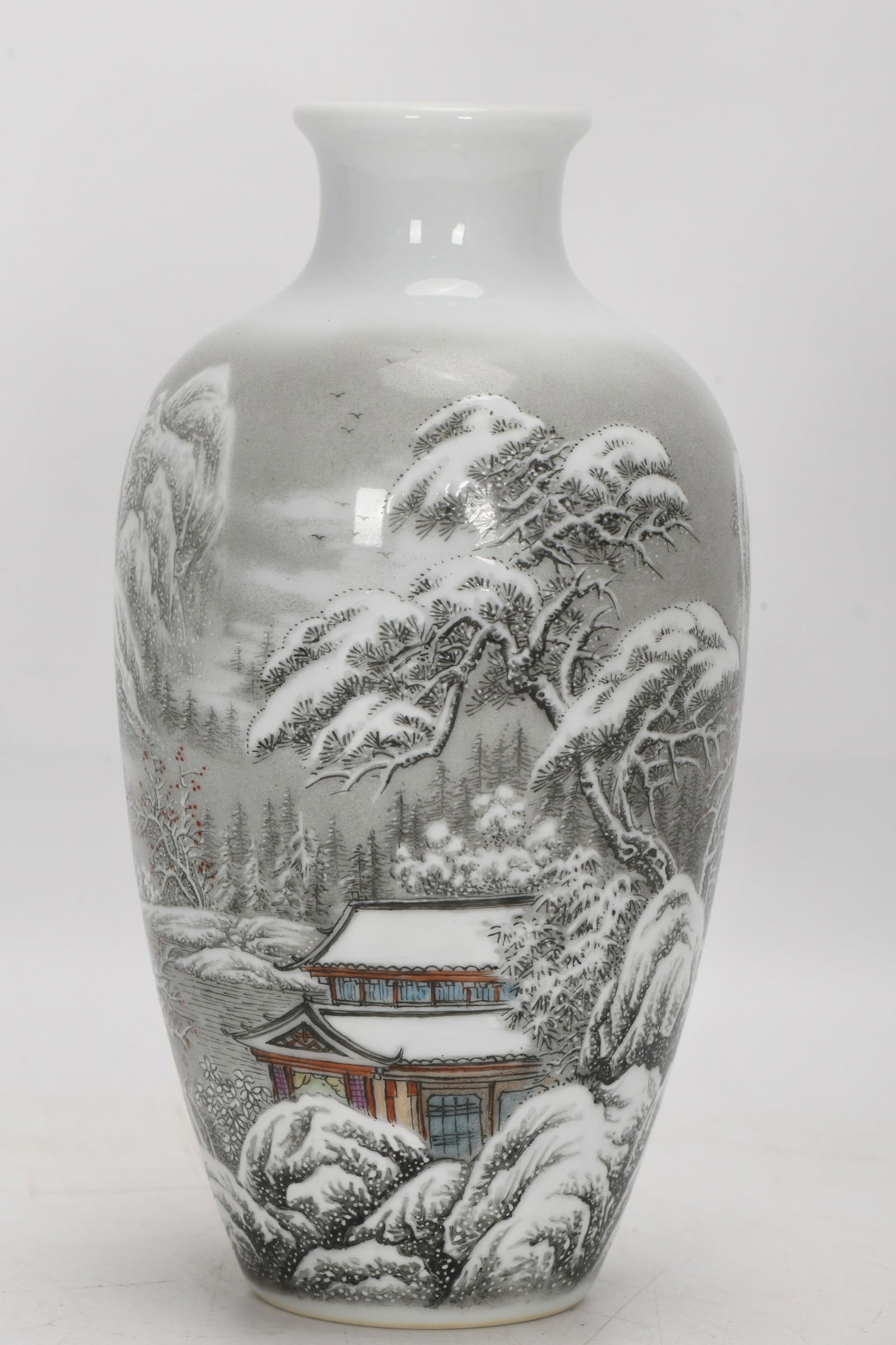 Qing Dynasty, Yongzheng Period, Enamel-painted Snow Scene and Landscape Vase: A Qing Dynasty, Yongzheng period, famille rose enamel vase depicting a snowy landscape. Height: 18 cm, Mouth diameter: 4.3 cm, Belly diameter: 10 cm, Base diameter: 4.8 cm. Provenance:from the collect
