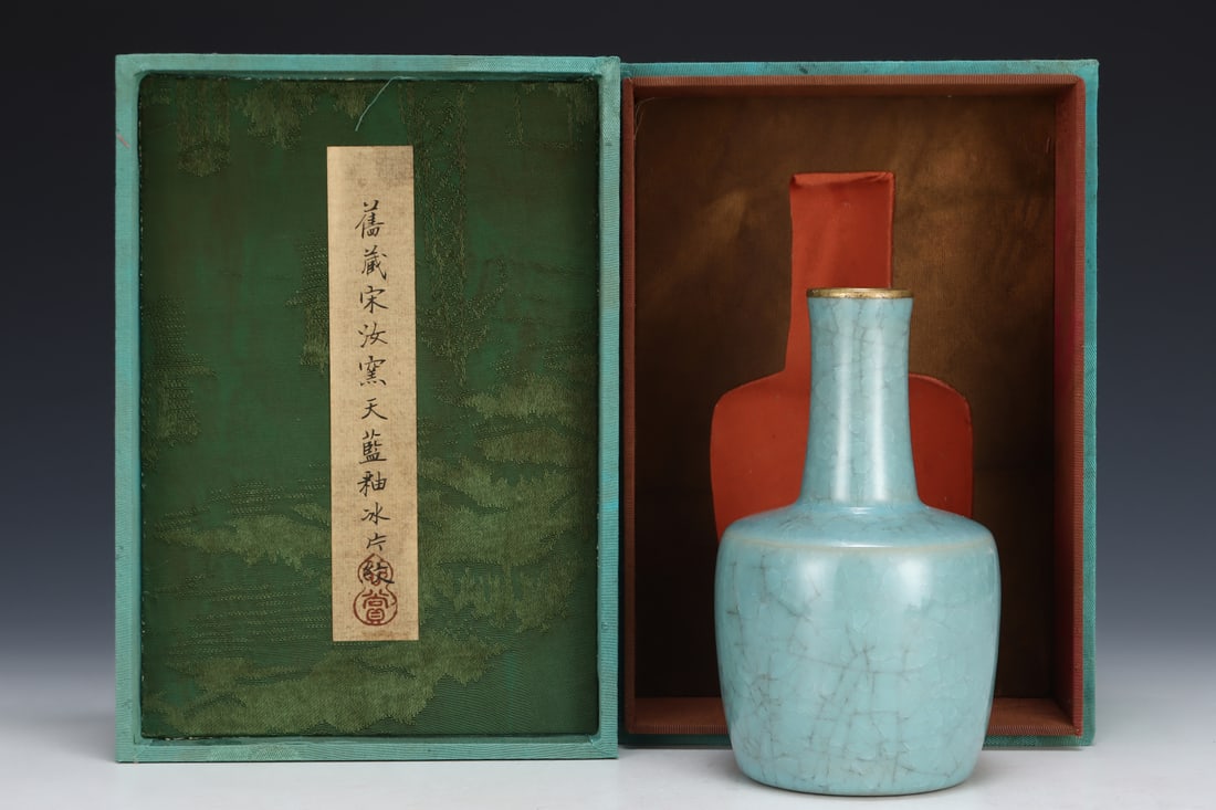 Formerly in the collection of a Song Dynasty Ru ware sky-blue glazed mallet-shaped vase: A Song Dynasty Ru ware sky-blue glazed mallet-shaped vase, formerly in the collection. Dimensions: Height: 16.5 cm; Diameter: 9.3 cm. Provenance:The Property of a Gentleman in Hampshire, United Kingdo