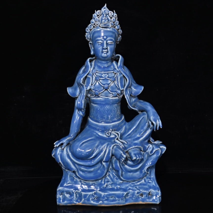 Ming Dynasty Yongle period celadon carved seated Guanyin: A Ming Dynasty Yongle period celadon-glazed carved seated Guanyin statue, 36.5 x 22 cm. Provenance:Private collection from a professor in University of Oxford. Our cooperative logistics services provi