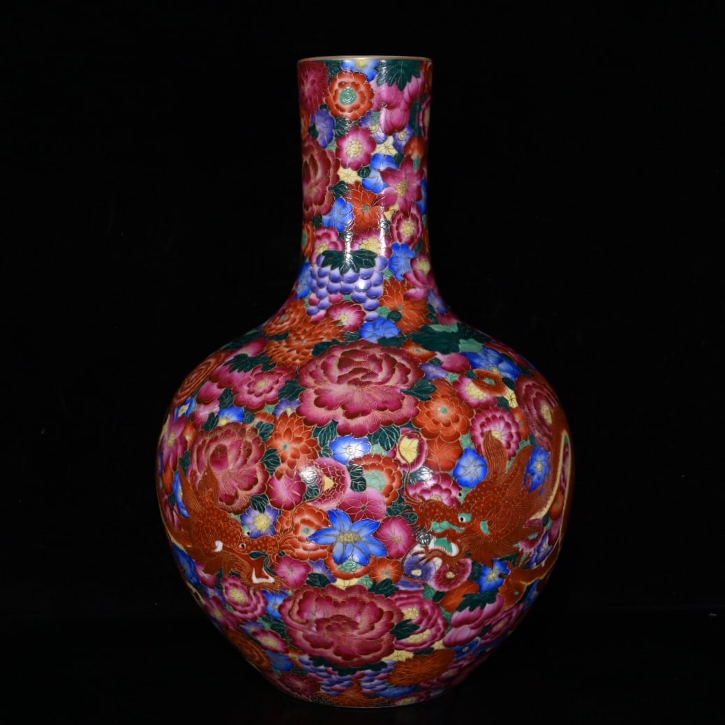 A Qianlong period polychrome gilt-painted celestial globe vase with filigree double dragon design.: A Qianlong period (1736-1745) polychrome gilt-painted filigree double dragon design celestial globe vase, 41x26cm Provenance:Private collection from a professor in University of Oxford. Our cooperativ