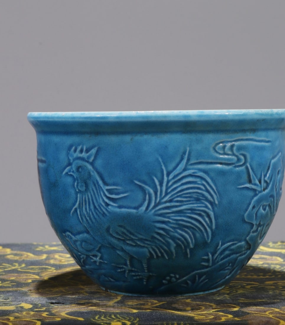 Formerly owned monochrome glazed porcelain chicken-patterned hand cup (1 of 8)