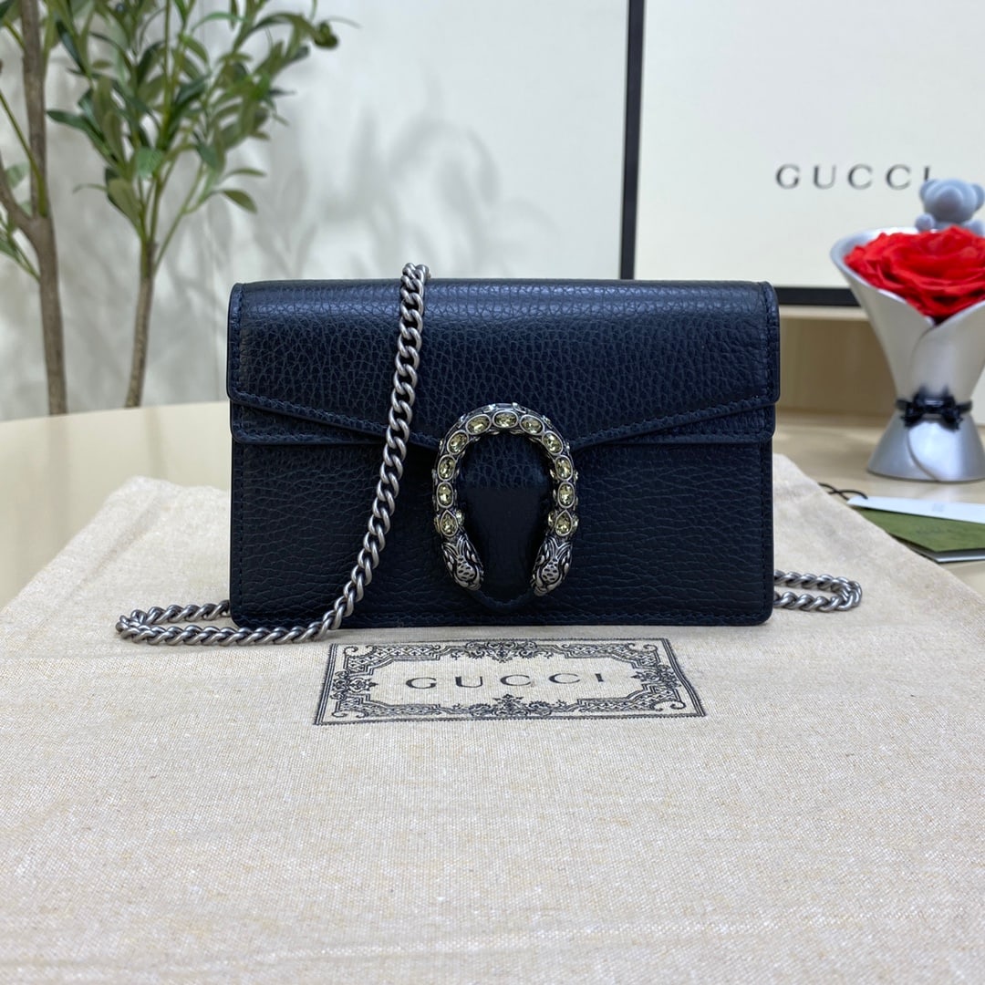 GUCCI Dionysus: The GUCCI Dionysus series leather mini handbag is a structured black leather chain mini handbag crafted from sturdy textured leather. It comes with a key ring for attaching to a larger handbag. The