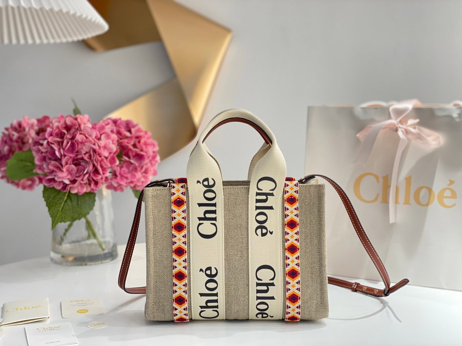 Chloe: Chloe's quilted brown shoulder strap Woody quilted tote bag is the perfect way to start a vibrant day. The bag features exquisite hand-embroidered details and a bohemian style. Released in early sprin