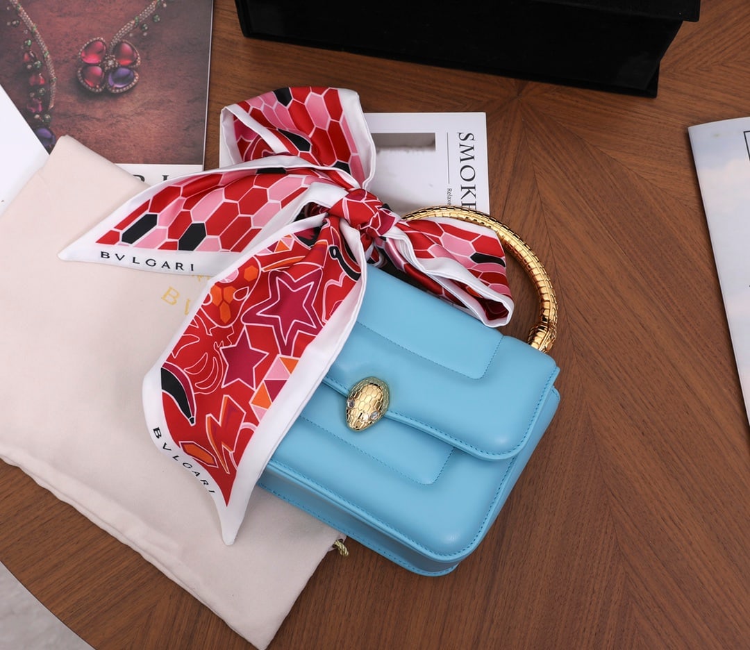 Bvlgari MARY KATRANTZOU: The Bvlgari MARY KATRANTZOU handbag collection reinterprets the classic Serpenti pattern, drawing inspiration from the serpent's metamorphosis. This exquisite collaboration features Aegean topaz blue 
