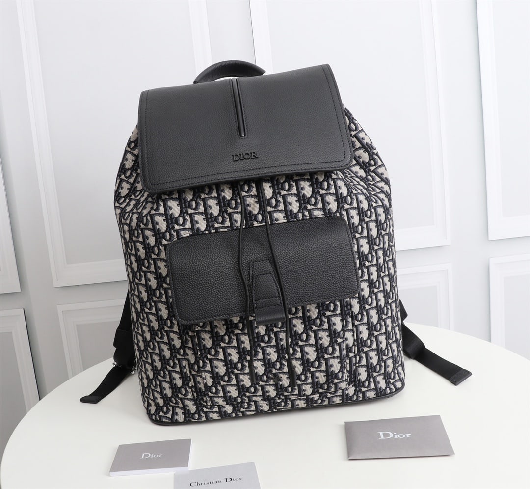 Christian Dior: Dior Men's OBLIQUE MOTION Backpack Model: 1MOBA062YPN (Apricot Jacquard) Beige and Black Oblique Print Front Brass Metal Coating DIOR Logo Interior with DIOR Embossed Logo Grained Cowhide Leather Flap