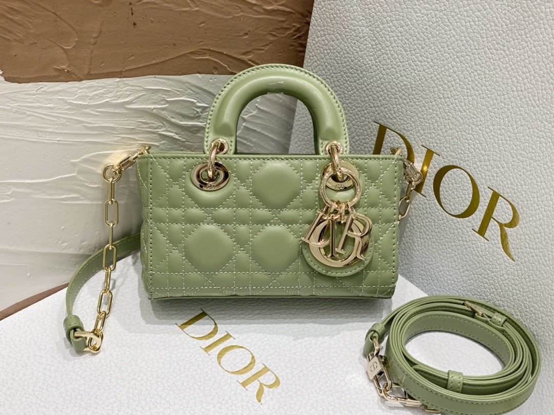 Christian Dior: The ultra-mini Dior d-joy Lady D-Joy handbag in dreamy green embodies Dior's profound insight into elegance and beauty. This sophisticated and classic design is crafted from green cannage-stitched lam