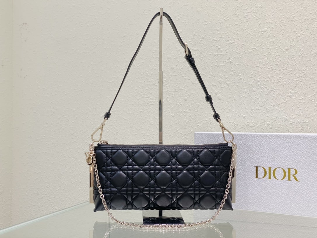 Christian Dior: The DIOR CLUB handbag in black lambskin cannage is a standout piece, highlighting a striking and practical design adorned with Dior's classic logo. It adds a modern touch and elegance to the summer