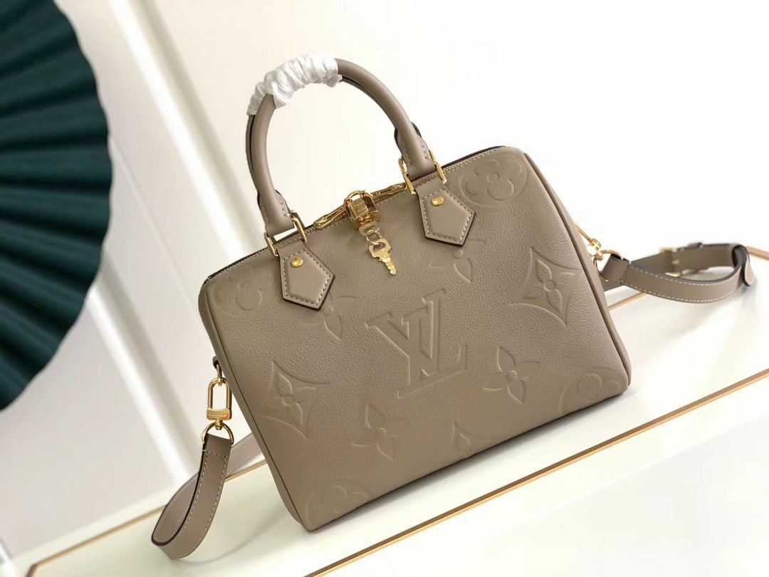 LV Speedy BandouliEre: The Speedy BandouliEre 25 handbag makes a striking return to the 2021 Fall Wild at Heart capsule collection, featuring an oversized LV logo embossed on Monogram Empreinte leather and a detachable