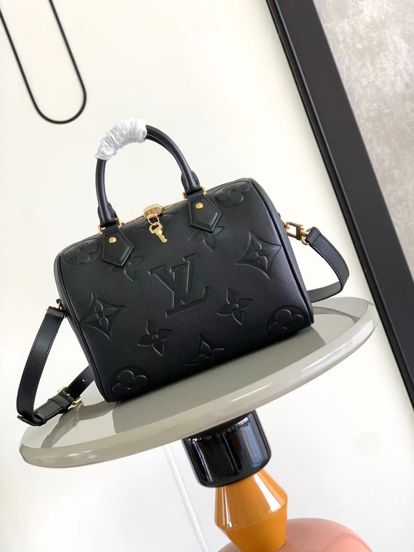LV Speedy BandouliEr: The Speedy BandouliEre 25 handbag makes a striking return to the 2021 Fall Wild at Heart capsule collection, featuring an oversized LV logo embossed on Monogram Empreinte leather and a detachable shou