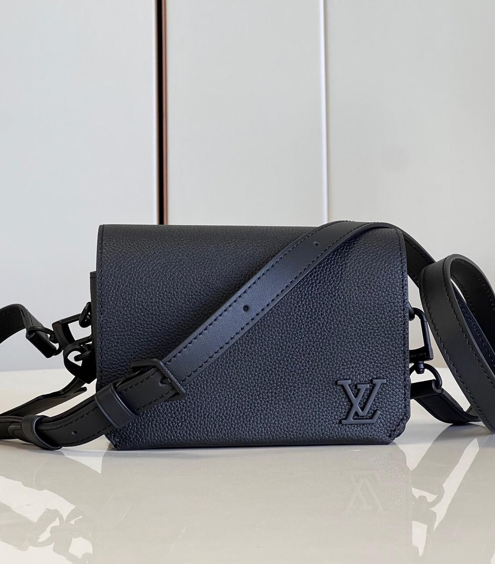 LV Fastline: The Fastline mini handbag combines grained calfskin leather with a bias-cut flap detail and LV monogram lettering on the front corner, highlighting the iconic design of the Aerogram collection. A