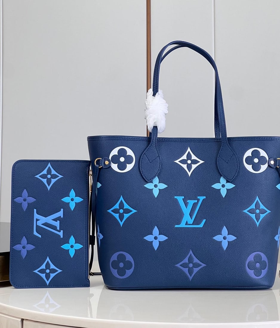 LV Neverfull: The Neverfull medium handbag exudes a soft and elegant charm in Monogram Empreinte leather, adorned with large, gradient-colored LV lettering and Monogram flowers. Unfastening the side drawstring