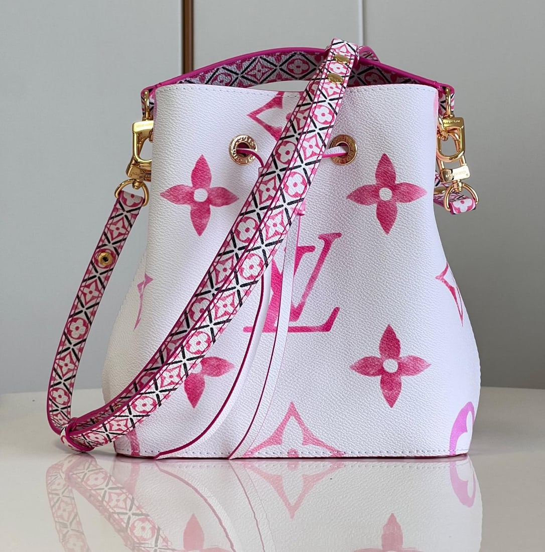 LV NeoNoE: The NeoNoE bucket bag features a Giant Monogram print on delicate canvas, giving the LV and Monogram flowers a watercolor effect in varying shades. It comes with a drawstring closure and a central
