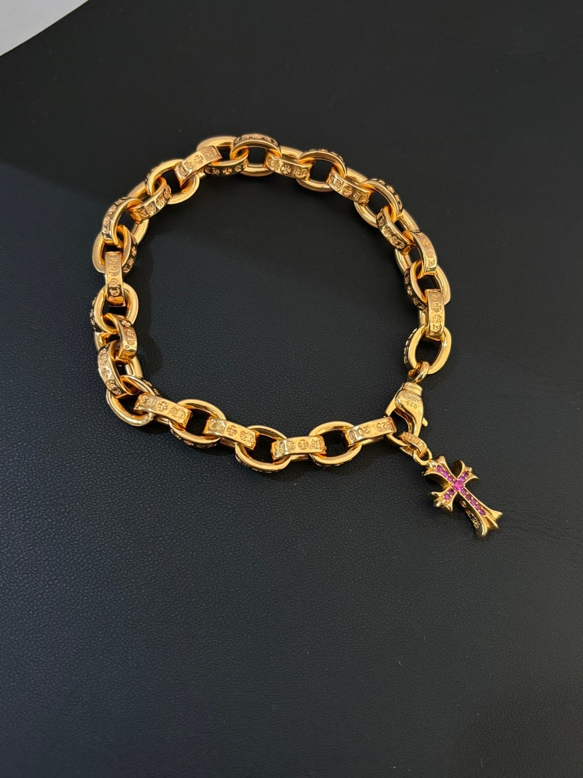 Chrome Hearts Bold Gold Letter Bracelet: Chrome Hearts Bold Gold Letter Bracelet Thank you for viewing our auction and we look forward to serving you as a valued Gold Standard Auctions customer! Each item has been carefully selected to bring
