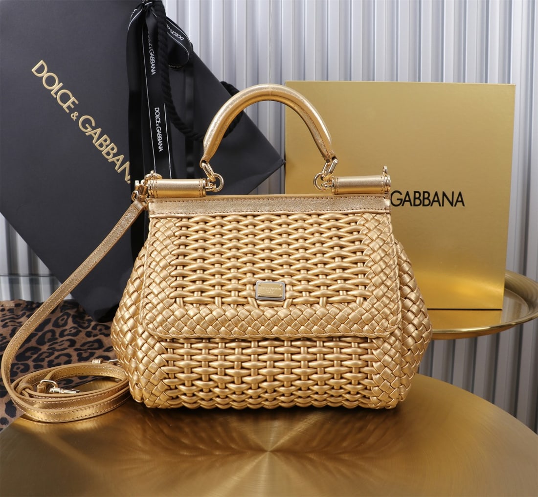 Dolce & Gabbana: Woven Size: 20x16x8cm. A signature hand-woven design from Dolce & Gabbana's Sicily brand, now presented in a compact version. Easily organizes frequently used items with a unique design. The front
