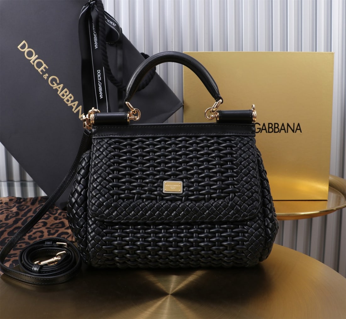 Dolce & Gabbana: Woven Size: 20x16x8cm. A signature hand-woven design from Dolce & Gabbana's Sicily brand, now presented in a compact version. Easily organizes frequently used items with a unique design. The front
