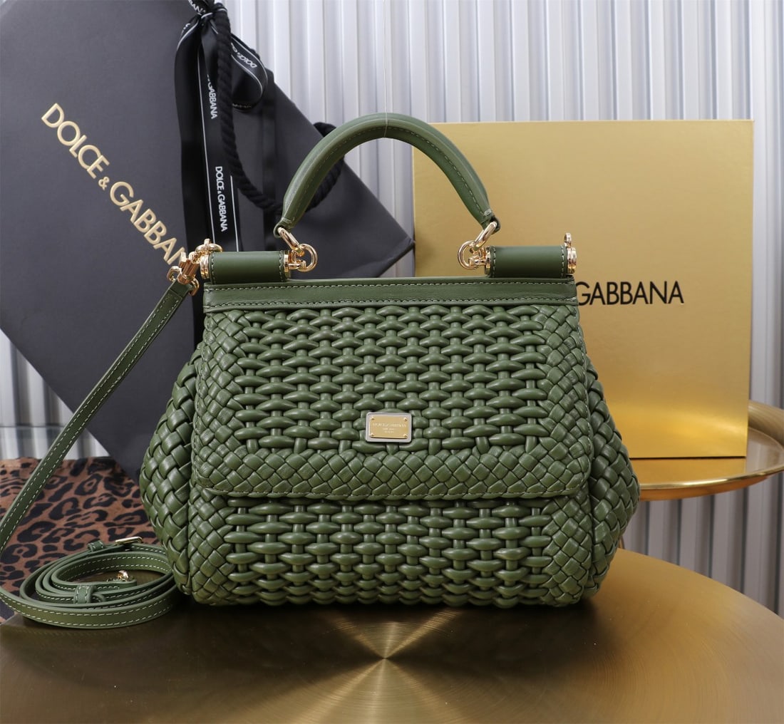 Dolce & Gabbana: Woven Size: 20x16x8cm. A signature hand-woven design from Dolce & Gabbana's Sicily brand, now presented in a compact version. Easily organizes frequently used items with a unique design. The front
