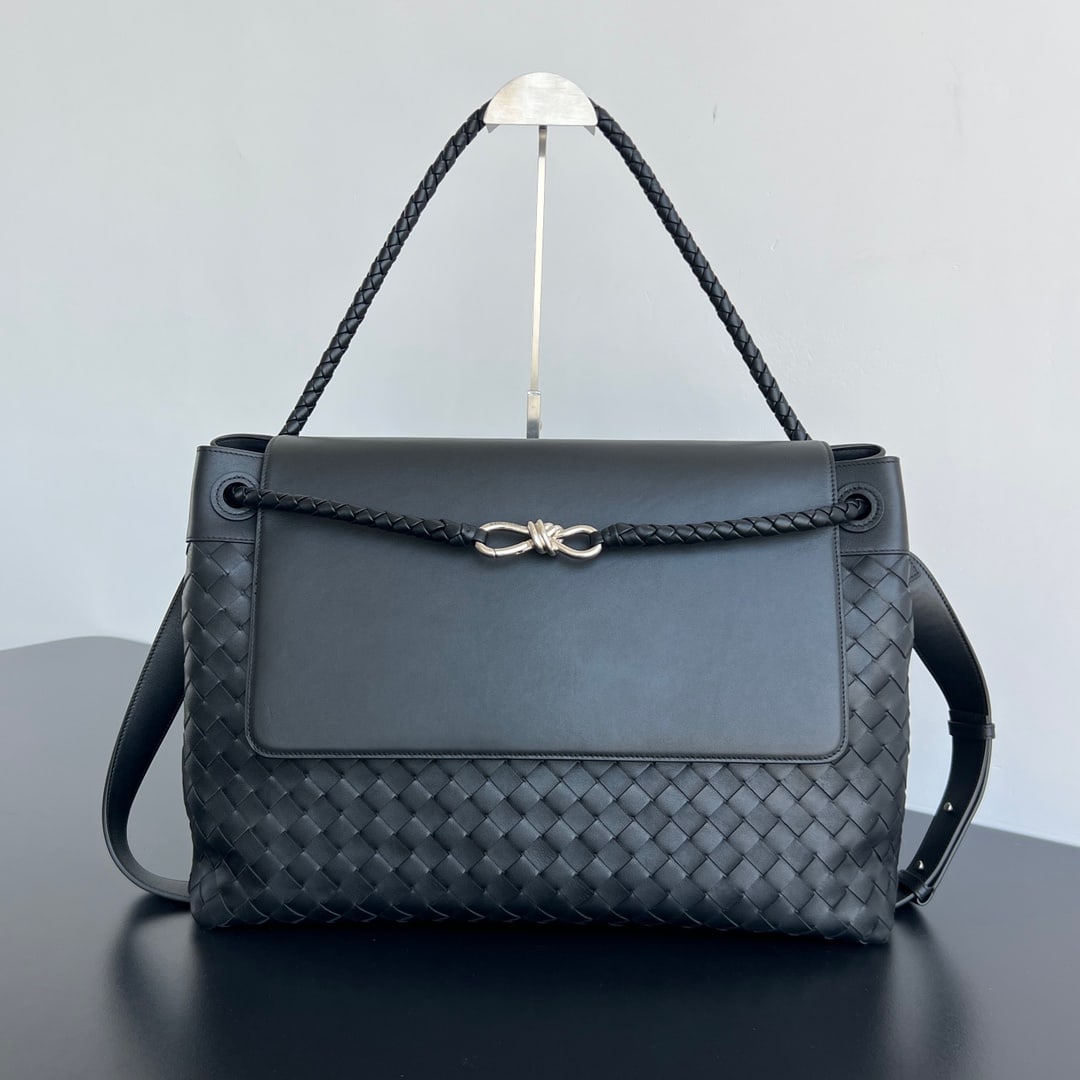 Bottega Veneta Men's Andiamo: The Bottega Veneta Andiamo men's bag is a stylish, versatile, and practical piece that can be carried by hand, over the shoulder, or crossbody. The iconic woven element combined with smooth leather cr