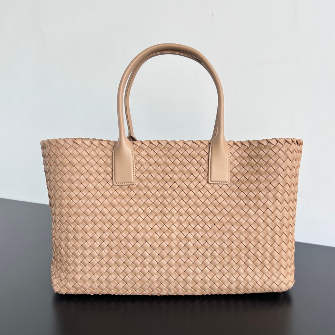 Bottega Veneta Cabat: The Bottega Veneta Cabat large tote bag is a classic that takes you back to its roots. Made with traditional woven straps and original leather, this handcrafted bag is incredibly soft and high-quality