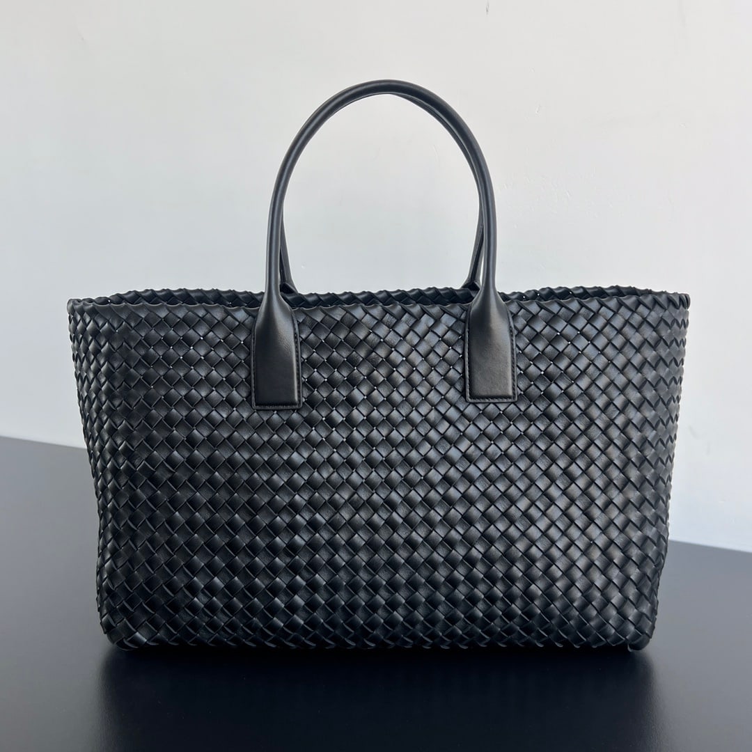 Bottega Veneta Cabat: The Bottega Veneta Cabat large tote bag is a classic that takes you back to its roots. Made with traditional woven straps and original leather, this handcrafted bag is incredibly soft and high-quality
