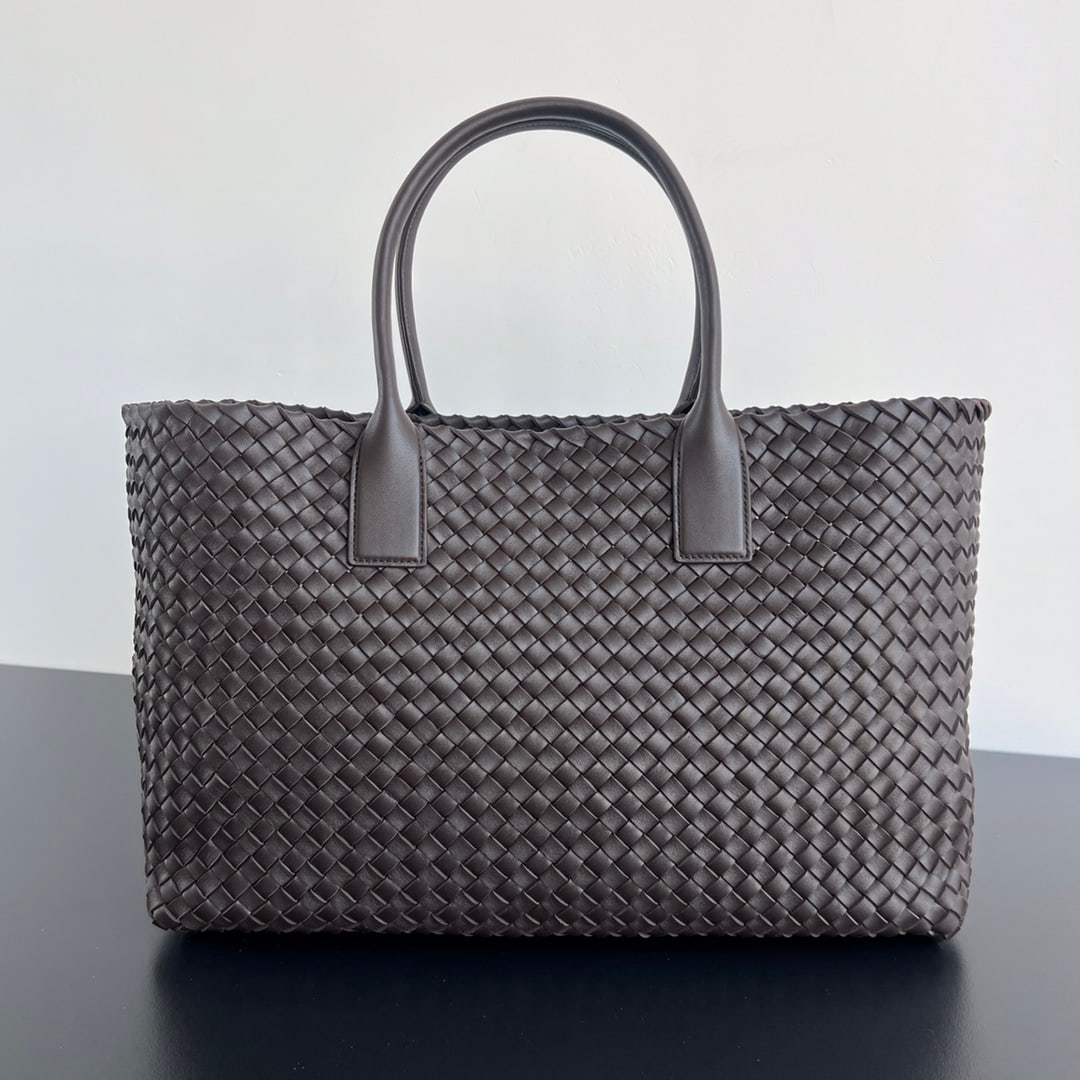 Bottega Veneta Cabat: The Bottega Veneta Cabat large tote bag is a classic that takes you back to its roots. Made with traditional woven straps and original leather, this handcrafted bag is incredibly soft and high-quality