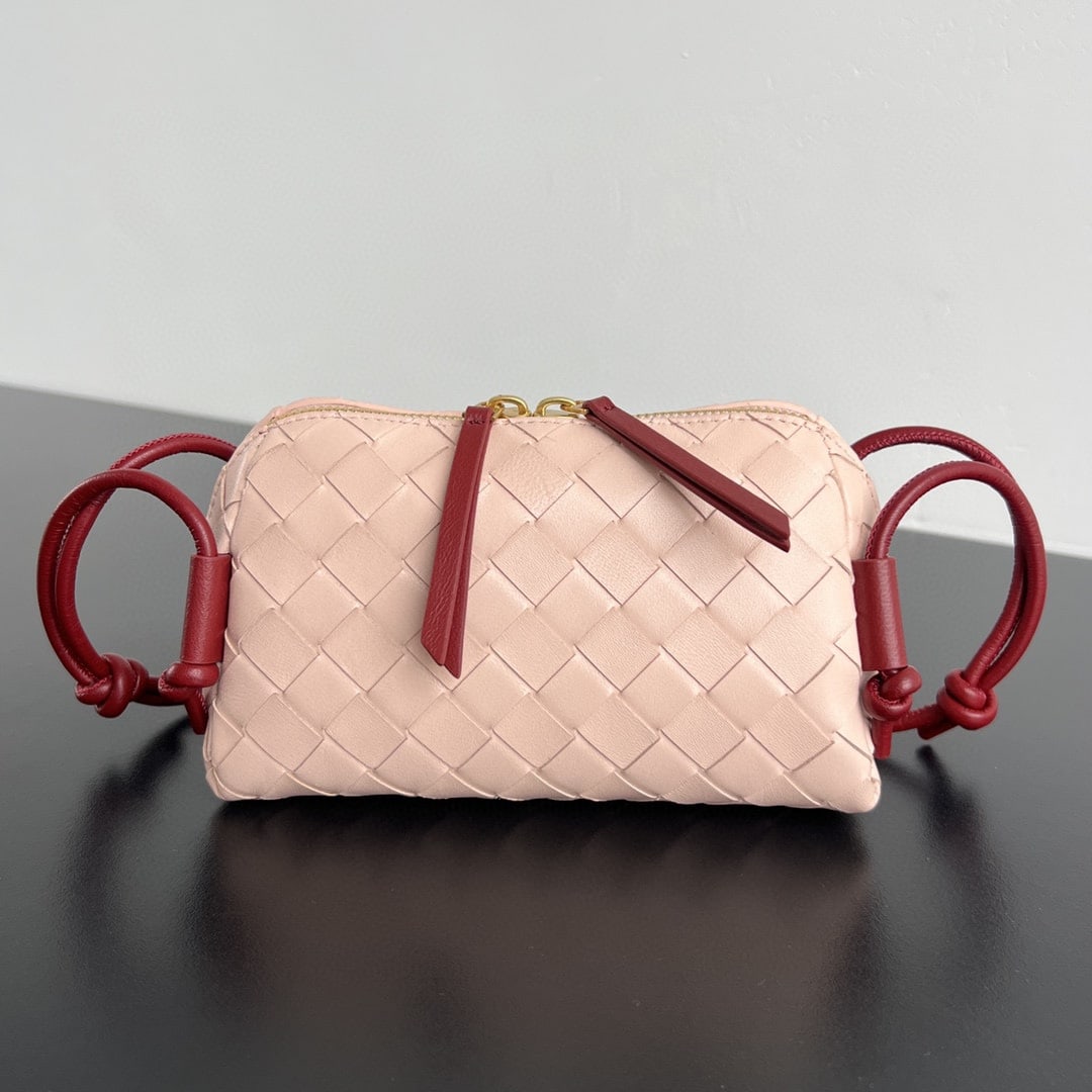 Bottega Veneta Concert pouch: The Bottega Veneta Concert Pouch is the most beautiful and practical mini bag I've ever seen. It features the classic intrecciato weave and a leather double-ended zipper opening for easy access. The s
